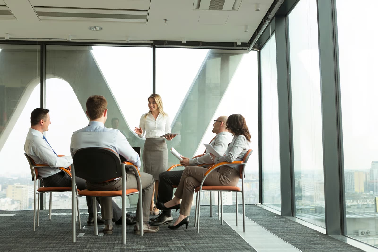 Oracle consultants reviewing an implementation plan with a client team